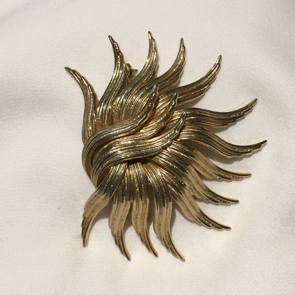 Vintage gold tone sun brooch